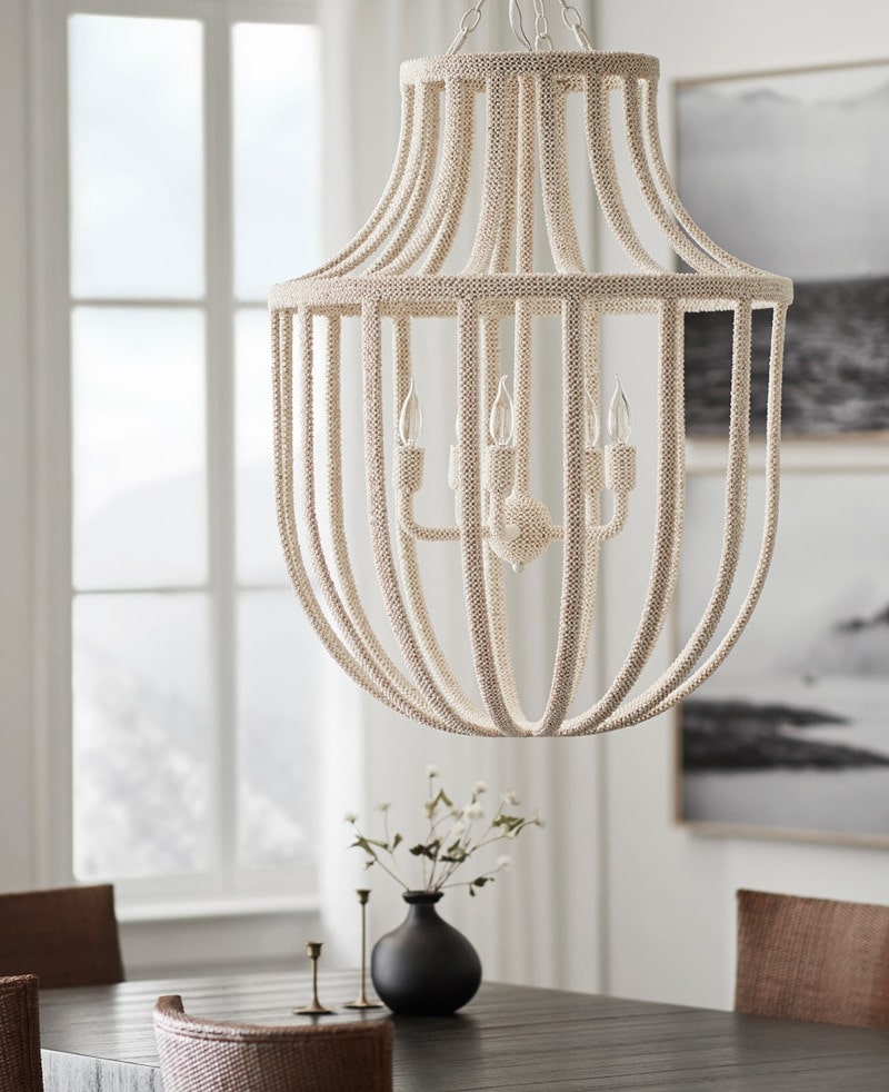 Palecek Paloma Coco Chandelier hanging over table